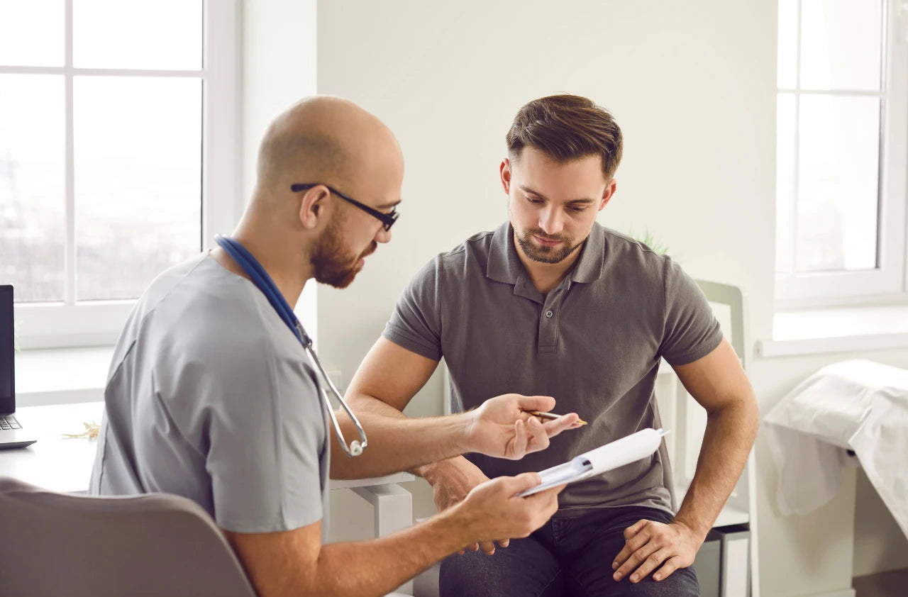 Man talking to doctor about TRT