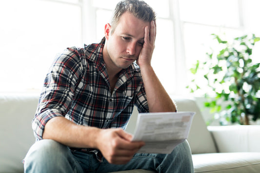 Man looking at paper