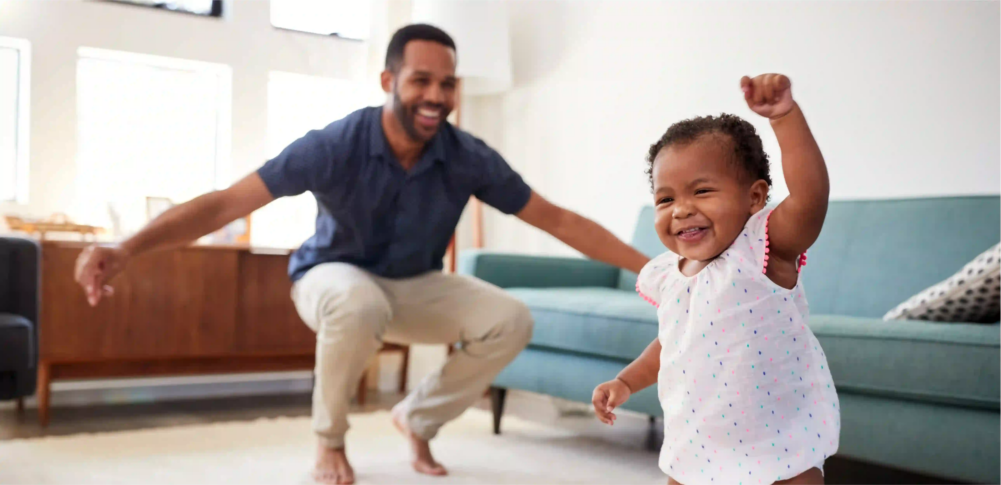 Dad dancing with toddler