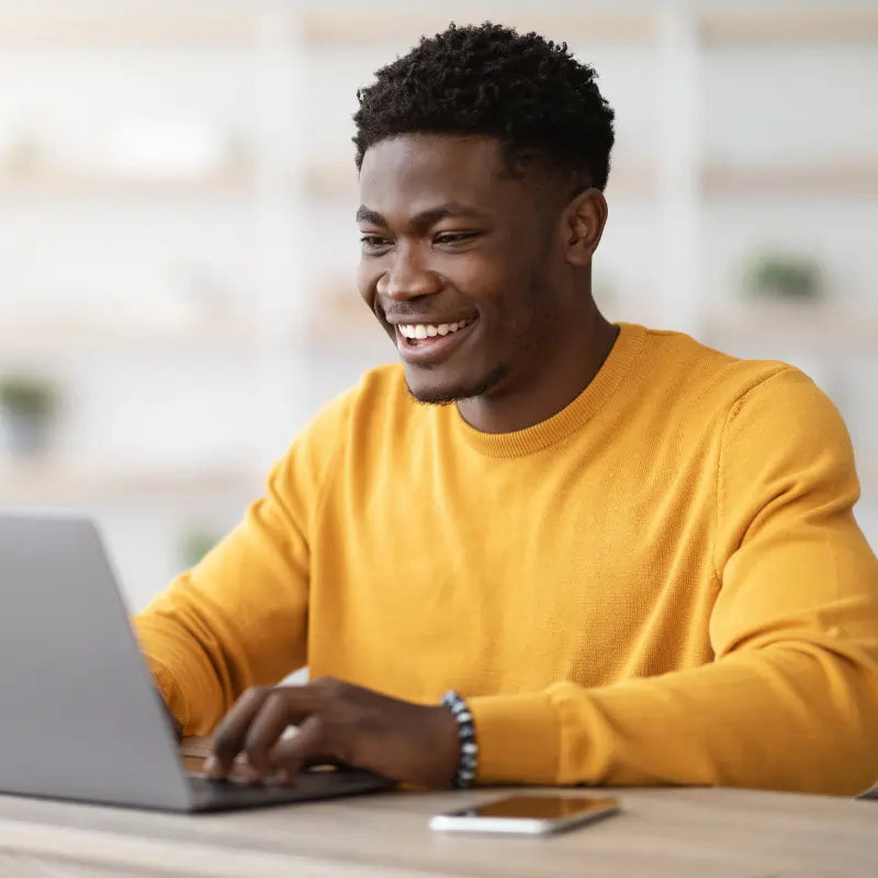 Man At Computer Ordering CryoChoice Sperm Collection Kit